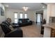 Spacious living room with recessed lighting, wood floors, and comfortable seating at 603 Saint Andrews Dr, Sarasota, FL 34243