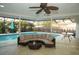 Inviting pool area featuring comfortable outdoor seating and lush landscaping at 603 Saint Andrews Dr, Sarasota, FL 34243