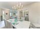 Dining room with decor, chandelier and view into living area at 6094 Amberly Dr, Bradenton, FL 34208