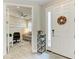 Welcoming entryway with a view into the living room and a decorative wreath on the front door at 6094 Amberly Dr, Bradenton, FL 34208