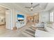 Open-concept living room with a view of the kitchen and dining area, perfect for entertaining at 6094 Amberly Dr, Bradenton, FL 34208