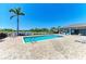 Community pool with a sun deck and lounge area offers a place to relax and cool off on a hot day at 6094 Amberly Dr, Bradenton, FL 34208