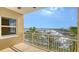 Waterfront balcony with white railings with a beautiful view of boats at 610 Riviera Dunes Way # 308, Palmetto, FL 34221