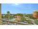 Balcony view showing the pool and clubhouse at 610 Riviera Dunes Way # 308, Palmetto, FL 34221
