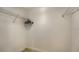 Walk-in closet with wire shelving and tiled floors offers ample storage space at 610 Riviera Dunes Way # 308, Palmetto, FL 34221