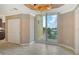 Bright living area with large sliding glass doors opening to a private balcony at 610 Riviera Dunes Way # 308, Palmetto, FL 34221