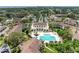 Aerial view of the community showcasing the pool, clubhouse, lush surroundings, and well-maintained landscaping at 6101 34Th W St # 28E, Bradenton, FL 34210