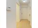 Bright hallway with tile flooring, leading to additional rooms within the home at 6101 34Th W St # 28E, Bradenton, FL 34210
