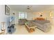 Cozy living room with comfortable seating, tile flooring, and ample natural light at 6101 34Th W St # 28E, Bradenton, FL 34210