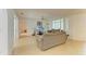 Open-concept living room with lots of light, neutral walls, and comfortable seating arrangements at 6101 34Th W St # 28E, Bradenton, FL 34210