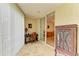 Enclosed patio featuring desk, cabinet, and sliding glass door to an office space at 6101 34Th W St # 28E, Bradenton, FL 34210