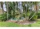 Beautiful water feature amid lush landscaping provides a serene and tranquil focal point, enhancing the community's charm at 6101 34Th W St # 28E, Bradenton, FL 34210