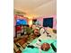 Bedroom with star decals on the ceiling and carpet flooring at 6265 Viola Ln, New Port Richey, FL 34653
