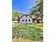 Two-story home featuring Tudor-style architecture at 6265 Viola Ln, New Port Richey, FL 34653