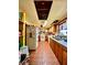 Galley kitchen showcasing wooden cabinets and vintage appliances at 6265 Viola Ln, New Port Richey, FL 34653