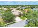 Beautiful single Gathering home with large driveway, manicured front yard and mature trees at 6470 Indigo Bunting Pl, Lakewood Ranch, FL 34202