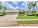 Beautiful single-Gathering home with a three-car garage and mature landscaping at 6470 Indigo Bunting Pl, Lakewood Ranch, FL 34202