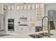 Well-equipped kitchen with stainless steel appliances, custom cabinets, and ample counter space at 6470 Indigo Bunting Pl, Lakewood Ranch, FL 34202