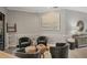 Well-lit living room with tasteful décor and comfortable seating at 6470 Indigo Bunting Pl, Lakewood Ranch, FL 34202