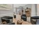 Inviting living room showcasing elegant furnishings and access to dining area at 6470 Indigo Bunting Pl, Lakewood Ranch, FL 34202