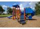 Bright and colorful playground equipment includes slides, climbing structures, and interactive elements for children at 6470 Indigo Bunting Pl, Lakewood Ranch, FL 34202