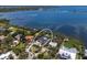 Breathtaking aerial view showcasing the home's prime waterfront location and surrounding natural beauty at 705 89Th Nw Ct, Bradenton, FL 34209