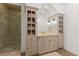 Well-appointed bathroom featuring a vanity with custom cabinets and a walk-in shower at 705 89Th Nw Ct, Bradenton, FL 34209