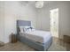 Bright bedroom with a comfortable bed, stylish furnishings, and an ensuite bathroom at 705 89Th Nw Ct, Bradenton, FL 34209