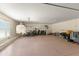 Spacious garage with ample room for vehicle storage, bikes, and recreation equipment at 705 89Th Nw Ct, Bradenton, FL 34209