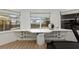 A bright home office space with built-in desk and storage, offering serene views at 705 89Th Nw Ct, Bradenton, FL 34209