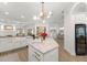 Island kitchen offering luxury countertop, stainless steel appliances, and sleek cabinetry at 705 89Th Nw Ct, Bradenton, FL 34209