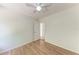 Bedroom featuring a ceiling fan and door to closet at 7810 34Th E Ct, Sarasota, FL 34243