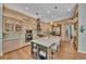 Well-equipped kitchen with granite countertops, stainless steel appliances, and ample storage space at 8105 Warwick Gardens Ln, University Park, FL 34201