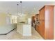 Bright kitchen featuring granite countertops, stainless steel appliances, and ample cabinet space at 8408 Whispering Woods Ct, Lakewood Ranch, FL 34202