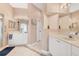 Spacious bathroom features tile flooring, double sinks, and a glass-enclosed shower at 8604 15Th Nw Ave, Bradenton, FL 34209