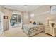 Bedroom with view of enclosed pool area through sliding glass door at 8604 15Th Nw Ave, Bradenton, FL 34209