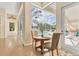 Enclosed breakfast nook with view of hot tub and pool at 8604 15Th Nw Ave, Bradenton, FL 34209