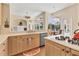 Kitchen features updated appliances, lots of countertop space, and breakfast nook with a view at 8604 15Th Nw Ave, Bradenton, FL 34209
