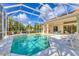 Inviting screened-in pool and patio area, perfect for relaxation and outdoor enjoyment at 8604 15Th Nw Ave, Bradenton, FL 34209