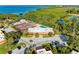 Community amenities include swimming pool, tennis courts, parking, and beautiful wooded areas at 9409 Catalina Dr, Bradenton, FL 34210