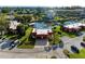 Aerial view showing private boat dock, waterfront access and meticulous landscaping at 9409 Catalina Dr, Bradenton, FL 34210