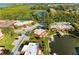A high angle shot of the building features meticulous landscaping, private boat dock and waterfront access at 9409 Catalina Dr, Bradenton, FL 34210