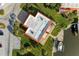 Drone eye view of the building features meticulous landscaping, private boat dock, and waterfront access at 9409 Catalina Dr, Bradenton, FL 34210