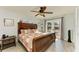 Spacious bedroom with a private outdoor patio, wood-look floors and a large bed at 9409 Catalina Dr, Bradenton, FL 34210
