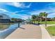 View of an in-water boat lift at the end of the dock on the water at 9409 Catalina Dr, Bradenton, FL 34210