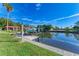 Lovely home featuring a private dock and boat lift, perfect for avid boaters seeking waterfront living at 9409 Catalina Dr, Bradenton, FL 34210