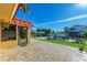 Waterfront property features a private boat lift, dock and brick paver patio perfect for enjoying the beautiful Florida weather at 9409 Catalina Dr, Bradenton, FL 34210
