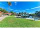 Beautiful landscaping, boat dock, paver patio and grill at 9409 Catalina Dr, Bradenton, FL 34210
