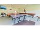 The game room features ping pong tables, providing ample space for recreational activities at 9409 Catalina Dr, Bradenton, FL 34210