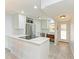 Modern kitchen with sleek countertops, stainless steel appliances, and ample cabinet space, perfect for cooking at 9409 Catalina Dr, Bradenton, FL 34210